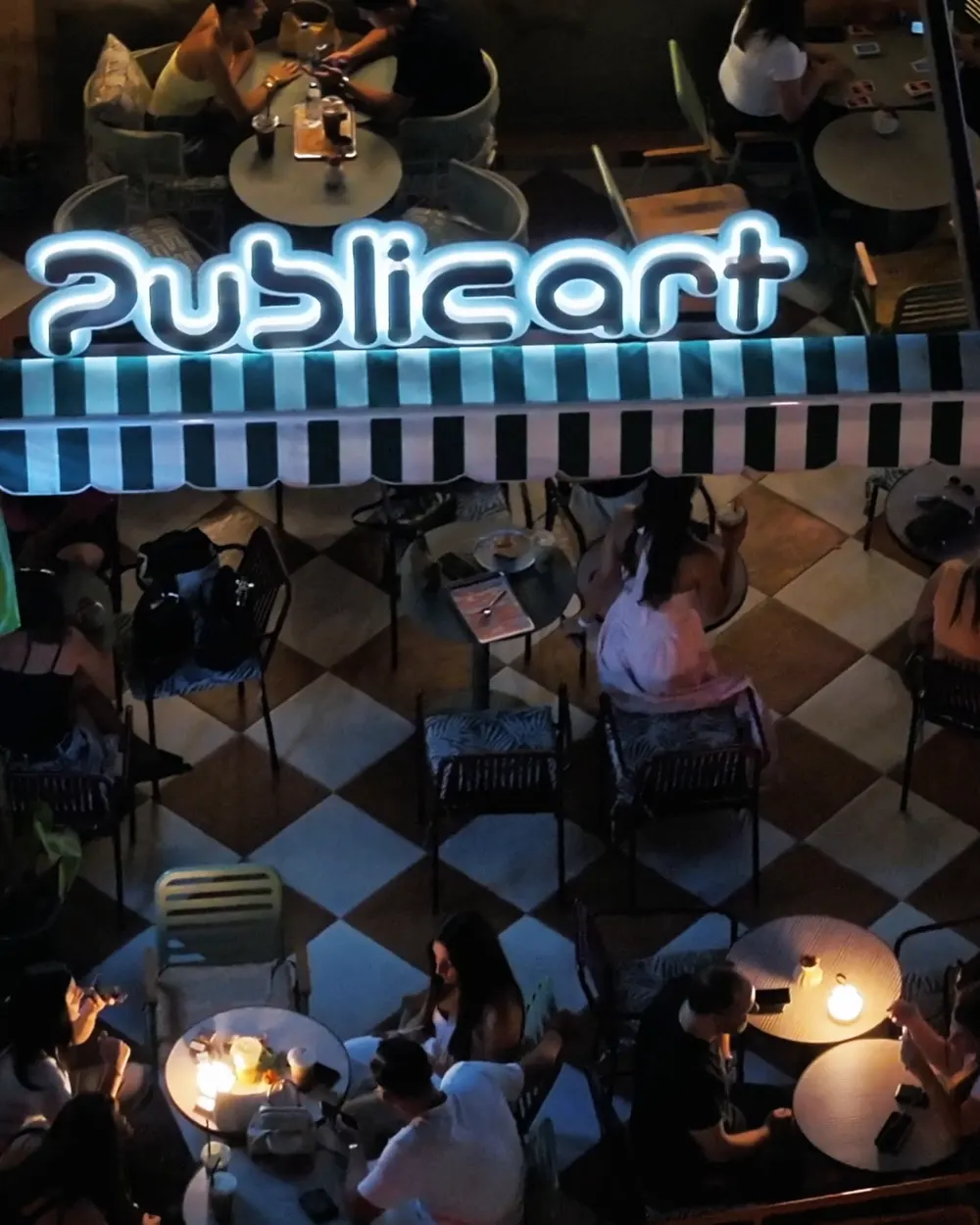 Terrace under the neon sign